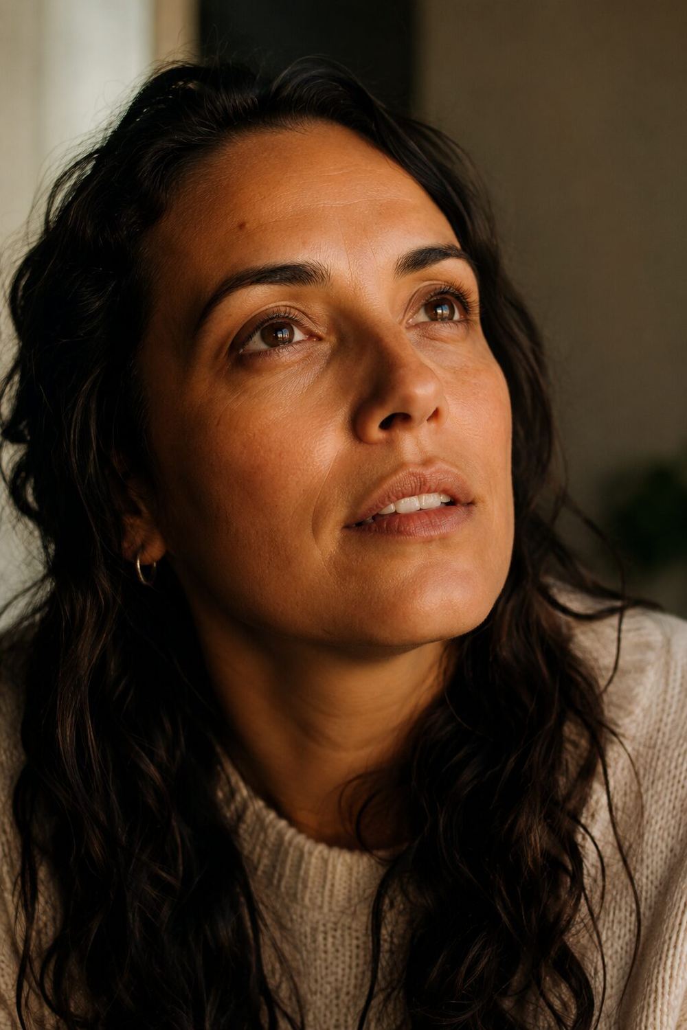 A woman in a quiet moment of realization